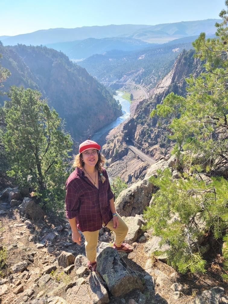 Kimber standing above the Colorado River in Kremmling, CO
